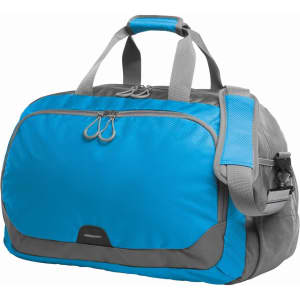 A duffle bag in vibrant blue and grey with handles and a detachable shoulder strap, featuring a logo.