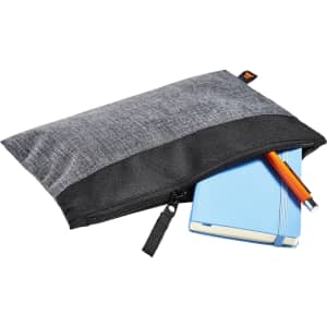 A black and grey zippered bag containing a blue notebook and a pencil, featuring a small logo.