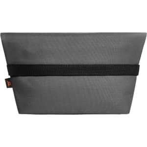 A grey cooler bag with a black strap and a logo, featuring a sleek, minimalistic design.