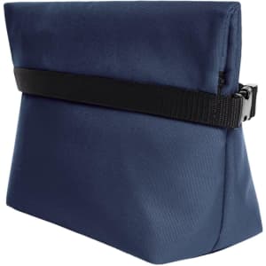 A dark blue cooler bag with a black strap, featuring a structured design and a zippered top.