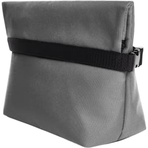 A grey cooler bag with a black strap, featuring a simple design and a zippered closure. It has a logo on the front.