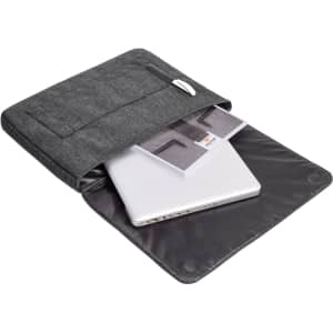 A grey laptop bag with a soft interior, featuring a pen holder and open compartments for a laptop and documents.