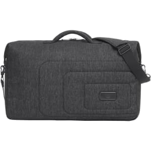 A grey duffle bag with a shoulder strap, featuring a logo and embossed detailing on the front.