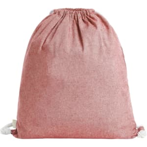 A drawstring bag in a soft red hue with a textured appearance and a logo on the side.