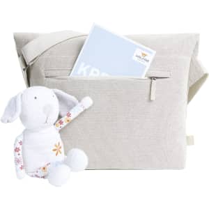 A light grey shoulder bag with a strap, featuring a front pocket and a stuffed toy dog beside it.