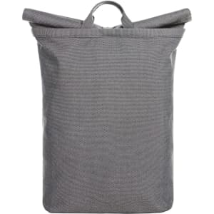 A grey backpack with a roll-top design and a top handle. It features a logo on the front.