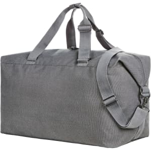 A grey duffle bag with dual handles and a detachable shoulder strap, featuring a simple design and a logo.