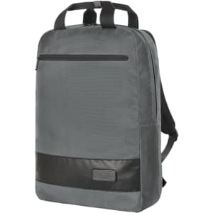 A grey and black Stage Notebook Backpack with a sleek design and logo, featuring adjustable straps and a zippered front pocket.