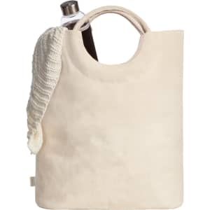 A cream-coloured tote bag with a rounded handle and a drink bottle inside, accompanied by a knitted item.