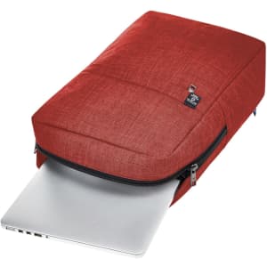 A red laptop backpack with a padded compartment and a zipper, designed to hold a laptop securely.