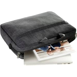 A grey laptop bag with a handle, partially unzipped to reveal a laptop and a notebook inside.