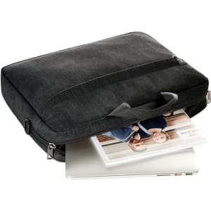 A grey laptop bag with a handle, partially unzipped, revealing a laptop and a notebook visible inside.