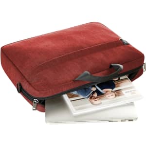 A red laptop bag with a handle, unzipped to reveal a silver laptop partially inside. It has a logo on the visible side.