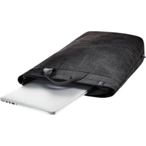 A black laptop backpack with a sleek, modern design, featuring a handle and a laptop partially visible inside.