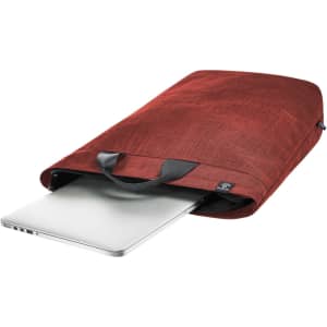 A red laptop backpack with a laptop partially inserted and black handles. It features a simple, modern design.