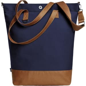 A navy blue tote bag with a brown base and a shoulder strap. It features a branded logo.