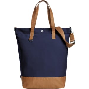 A navy blue tote bag with tan accents and handles, featuring a strap and a logo.
