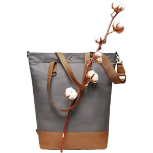 A grey and tan tote bag with a plant branch featuring cotton bolls, and an attached shoulder strap.
