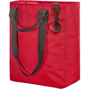 A red tote bag with black straps and a pair of sunglasses resting on top. The bag features a logo.