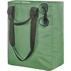 A green tote bag with black straps, featuring a pair of sunglasses resting on the side. It has a logo.