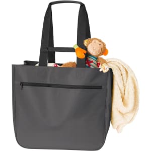 A grey tote bag with long handles, featuring a toy monkey and a blanket peeking out from inside.