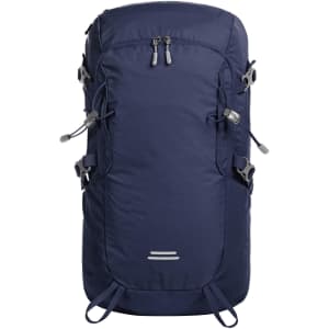 A navy outdoor backpack with adjustable straps, multiple pockets, and a logo on the front.