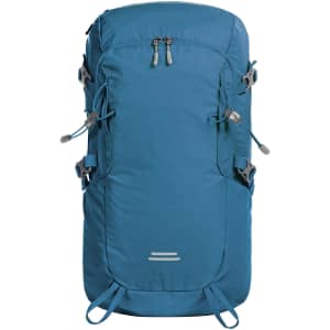 A blue outdoor backpack with adjustable straps and multiple compartments. It features a logo on the front.