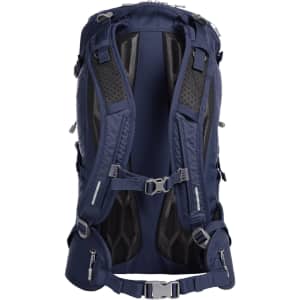 A navy outdoor backpack with padded straps, mesh panels, and multiple zippered pockets. It features a logo on the back.