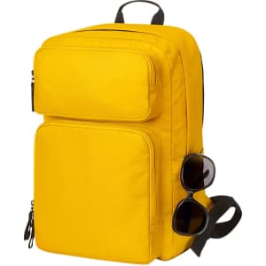 A yellow laptop backpack with two front pockets and a pair of sunglasses resting on it.