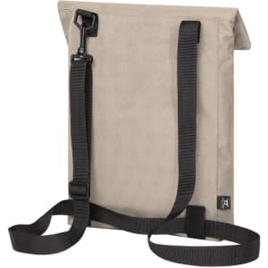 A beige backpack with adjustable black straps and a clip closure, featuring a logo.