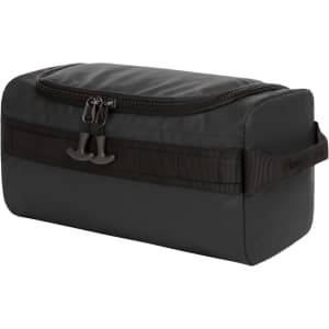 A black toiletry bag with a zippered closure and a carrying handle, featuring a logo on the front.