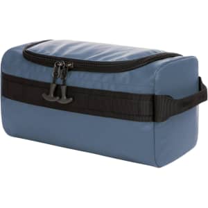 A blue toiletry bag with a zippered top and a black strap. It features a logo on the front.
