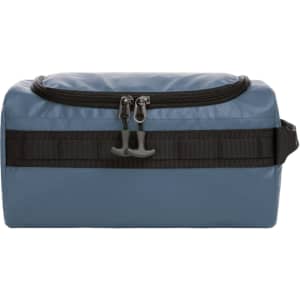 A blue toiletry bag with a zip closure and a black strap detailing, featuring a logo.