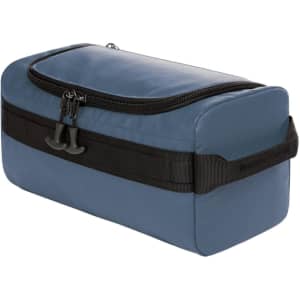 A blue toiletry bag with a black zipper and strap. It features a sturdy design and a logo on the side.