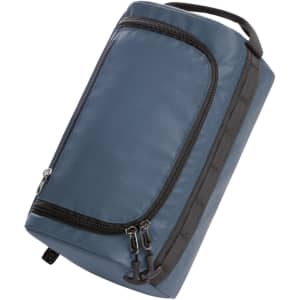 A dark blue toiletry bag with a zip closure and a sturdy handle, featuring a logo on the side.