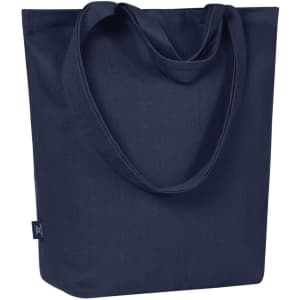 A navy blue tote bag with a simple design and long handles. It features a logo on the side.