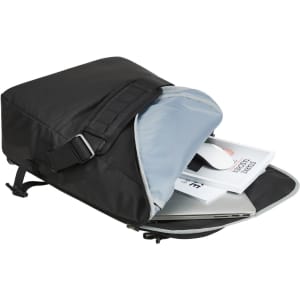 A black laptop bag with a grey interior, unzipped to reveal a laptop, mouse, and notebooks inside.