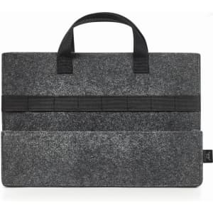 A grey felt bag with black handles and multiple elastic loops. It has a large flat pocket at the base.
