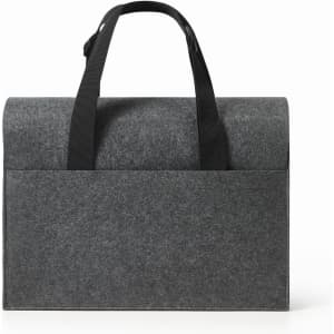 A grey felt laptop bag with black straps, featuring a minimalistic design and a structured shape.