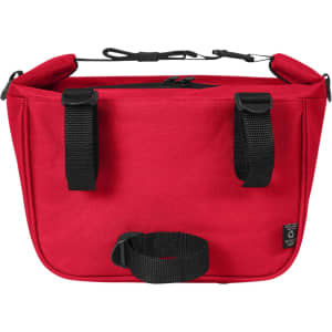 A red Softbasket lunch bag featuring adjustable straps and a handle, with a simple design and a logo.