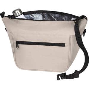 A soft, beige lunch bag with a black strap and exterior zip pocket holding a drink bottle inside.