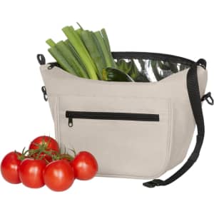 A light grey Softbasket Lunchbag with black accents, featuring vegetables and a zippered pocket.