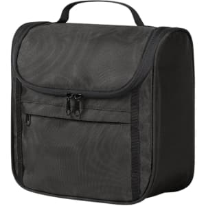 A black toiletry bag features a main compartment with a zippered closure and a front pocket, ideal for organising essentials.