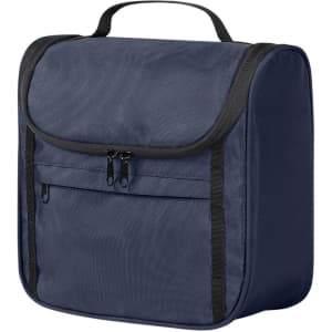 A navy toiletry bag with a flap closure, featuring a front zip pocket and a sturdy handle. It has branding on the side.
