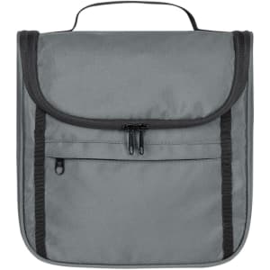 A grey toiletry bag with a flap, featuring a zippered pocket and a handle on top. It has logo branding.