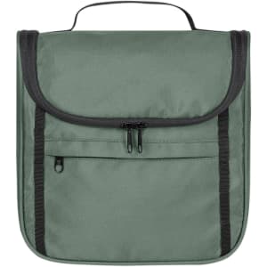 A green toiletry bag with a flap closure, featuring a front zip pocket and a carry handle on top.