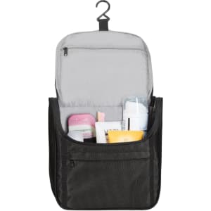 A black toiletry bag containing various personal care products, with a hanger for easy access.