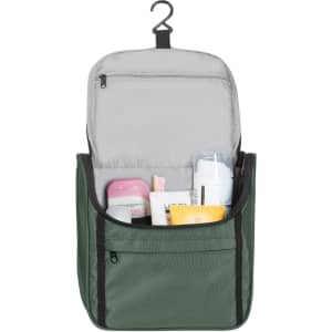 A green toiletry bag with a hook, filled with various personal care products and a zippered compartment.
