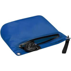 A blue zipper dry bag contains car keys and features an integrated strap. The bag has a logo on it.