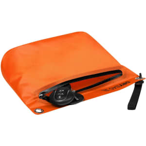 An orange dry bag with a zip closure, featuring a key fob inside and a branded logo.
